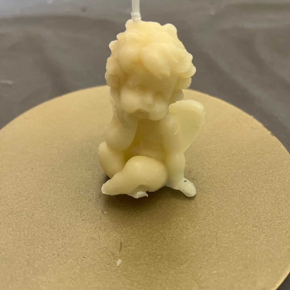 cream angle candle